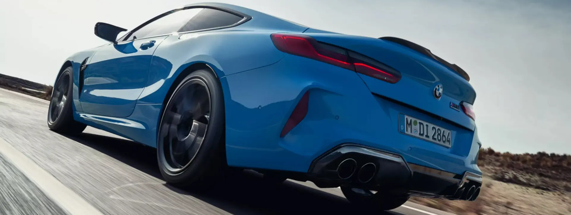 BMW M8 Rear Left Quarter View